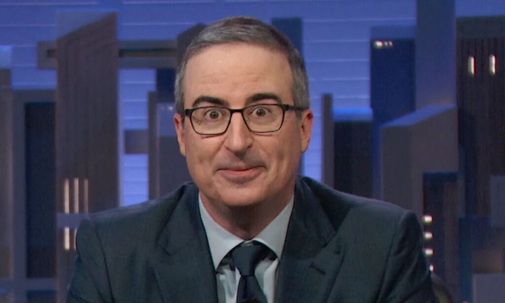 John Oliver interviewing a guest on 'Last Week Tonight; 